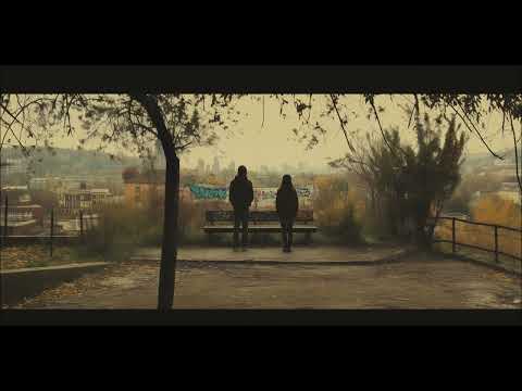 Em. - Historie